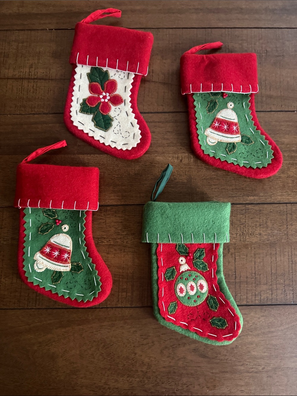 Four mini red green felt Christmas stocking